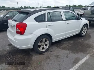 2011 Dodge Caliber Mainstreet with VIN 1B3CB3HA0BD157191, listed as a IAAI auction lot 42128580 with 185,474 mi miles. Bid and sale history available at carsss.com. Image 4.