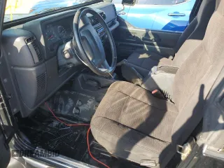 2003 Jeep Wrangler X with VIN 1J4FA39S73P340698, listed as a Copart auction lot 73888624 with 49,677 mi miles and Salvage Title. Bid and sale history available at carsss.com. Image 7.