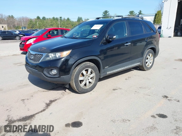 2013 Kia Sorento LX with VIN 5XYKTCA60DG347929, listed as a IAAI auction lot 42144507 with 210,216 mi miles. Bid and sale history available at carsss.com. Image 2.