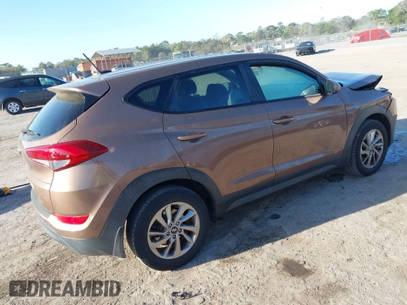 2017 Hyundai Tucson SE with VIN KM8J23A40HU525982, listed as a IAAI auction lot 41790898 with 107,715 mi miles. Bid and sale history available at carsss.com. Image 4.