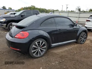 2014 Volkswagen Beetle Turbo R-Line with VIN 3VWVT7AT2EM603435, listed as a Copart auction lot 72755524 with 99,300 mi miles and Salvage Title. Bid and sale history available at DreamBid. Image 3.