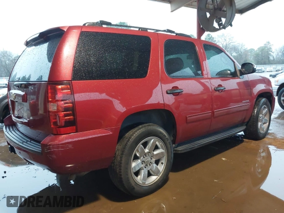 2013 Chevrolet Tahoe LS with VIN 1GNSCAE09DR171918, listed as a IAAI auction lot 41573324 with 175,935 mi miles and . Bid and sale history available at DreamBid. Image 4.