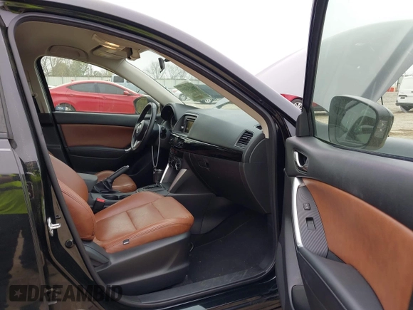 2014 Mazda CX-5 Touring with VIN JM3KE2CY7E0341658, listed as a IAAI auction lot 41915807 with 99,287 mi miles. Bid and sale history available at carsss.com. Image 5.