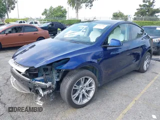 2023 Tesla Model Y Long Range z VIN 7SAYGDEE5PA102285, wystawiony jako IAAI lot #42402981 z przebiegiem 24 550 mil mil oraz . Historia ofert i sprzedaży dostępna na DreamBid. Obrazek 20.