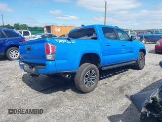 2021 Toyota Tacoma SR z VIN 3TMCZ5AN8MM374398, wystawiony jako IAAI lot #42297138 z przebiegiem 87 205 mil mil oraz . Historia ofert i sprzedaży dostępna na DreamBid. Obrazek 4.