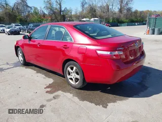 2007 Toyota Camry CE with VIN JTNBE46K073031988, listed as a IAAI auction lot 42062321 with 238,925 mi miles. Bid and sale history available at carsss.com. Image 3.