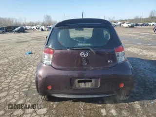2012 Scion iQ z VIN JTNJJXB00CJ014966, wystawiony jako Copart lot #83100954 z przebiegiem 100 775 mil mil oraz Szkoda całkowita • Salvage title. Historia ofert i sprzedaży dostępna na DreamBid. Obrazek 6.