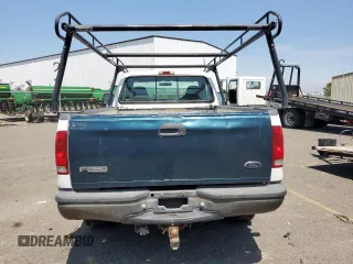 1999 Ford F-250 XL with VIN 1FTNF21L2XEE17853, listed as a Copart auction lot 58869285 with 140,220 mi miles and Clean title. Bid and sale history available at DreamBid. Image 6.