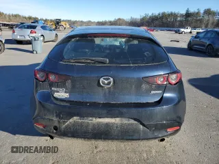 2019 Mazda 3 with VIN JM1BPBJM2K1131512, listed as a Copart auction lot 87112664 with Not provided miles and Salvage title. Bid and sale history available at DreamBid. Image 6.