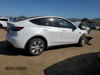 2024 Tesla Model Y Long Range with VIN 7SAYGDEE0RF081948, listed as a Copart auction lot 52612805 with 12,099 mi miles and Salvage Title. Bid and sale history available at DreamBid. Image 3.