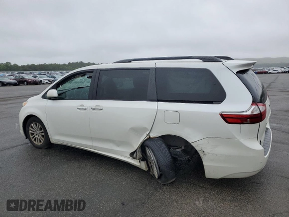 2016 Toyota Sienna XLE with VIN 5TDYK3DC8GS748036, listed as a Copart auction lot 60047235 with 147,203 mi miles and Salvage title. Bid and sale history available at DreamBid. Image 2.