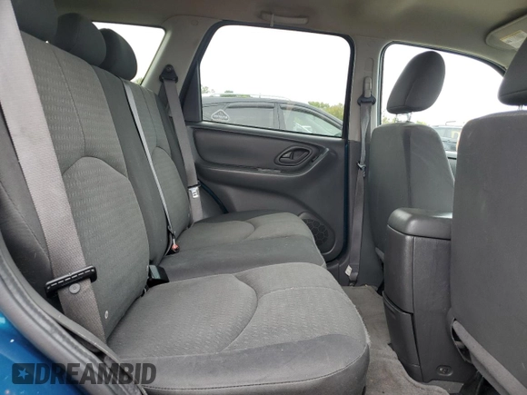 2005 Mazda Tribute i with VIN 4F2YZ02ZX5KM17738, listed as a Copart auction lot 72346384 with 203,245 mi miles and Salvage Title. Bid and sale history available at carsss.com. Image 11.