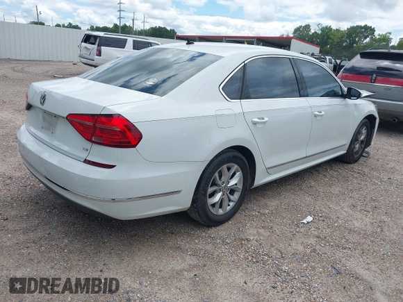 2016 Volkswagen Passat S with VIN 1VWAT7A32GC031172, listed as a IAAI auction lot 42231645 with 112,974 mi miles and . Bid and sale history available at DreamBid. Image 4.