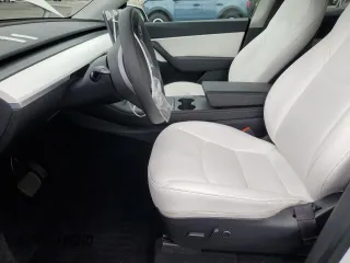 2021 Tesla Model Y Long Range with VIN 5YJYGDEEXMF151686, listed as a Copart auction lot 53903115 with 65,321 mi miles and Salvage Title. Bid and sale history available at DreamBid. Image 7.