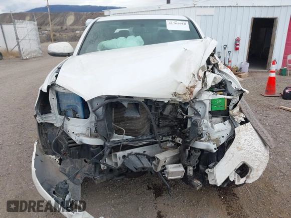 2017 Toyota Tacoma SR5 z VIN 3TMCZ5AN8HM077203, wystawiony jako IAAI lot #41765910 z przebiegiem 170 863 mil mil oraz . Historia ofert i sprzedaży dostępna na DreamBid. Obrazek 12.