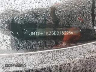 2014 Mazda 2 Sport with VIN JM1DE1KZ5E0182256, listed as a Copart auction lot 71729814 with Not Provided miles and Salvage Title. Bid and sale history available at carsss.com. Image 12.