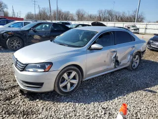 2012 Volkswagen Passat SE with VIN 1VWBP7A34CC045562, listed as a Copart auction lot 48710615 with 165,492 mi miles and Salvage Title. Bid and sale history available at carsss.com. Image 1.