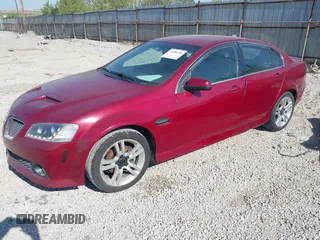 2009 Pontiac G8 z VIN 6G2ER57799L170338, wystawiony jako IAAI lot #42088706 z przebiegiem 157 582 mil mil oraz . Historia ofert i sprzedaży dostępna na DreamBid. Obrazek 2.
