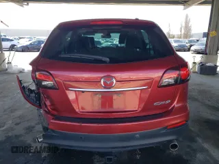 2014 Mazda CX-9 Grand Touring z VIN JM3TB2DVXE0439729, wystawiony jako Copart lot #49188875 z przebiegiem 113 839 mil mil oraz Szkoda całkowita • Salvage title. Historia ofert i sprzedaży dostępna na DreamBid. Obrazek 6.