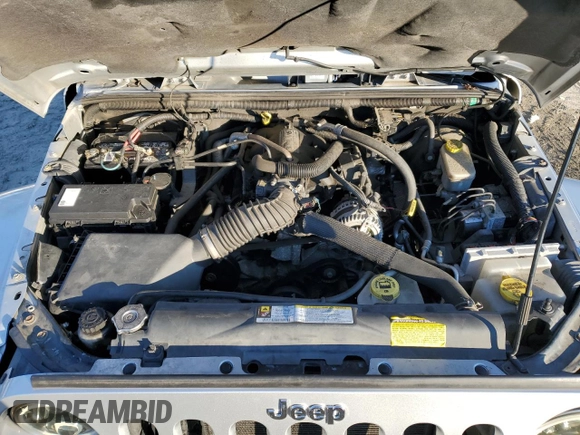2011 Jeep Wrangler Sahara with VIN 1J4GA5D14BL628876, listed as a Copart auction lot 87317374 with 84,179 mi miles and Salvage Title. Bid and sale history available at DreamBid. Image 11.