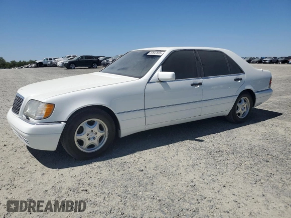 1997 Mercedes-Benz S-Class with VIN WDBGA33G2VA340711, listed as a Copart auction lot 52647695 with 90,224 mi miles and Salvage Title. Bid and sale history available at carsss.com. Image 1.