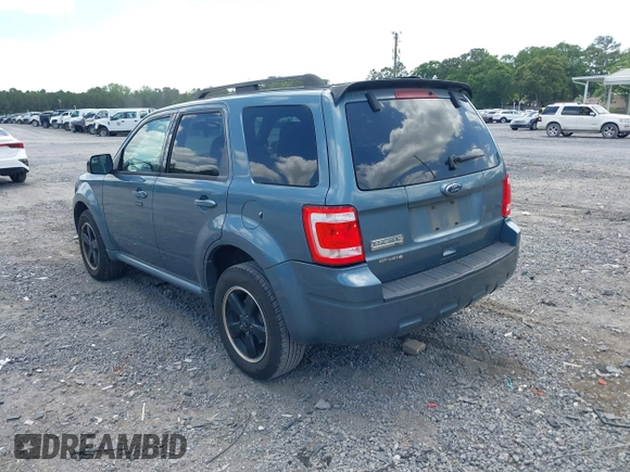 2011 Ford Escape XLT with VIN 1FMCU0D74BKA42232, listed as a IAAI auction lot 42144143 with 231,025 mi miles. Bid and sale history available at carsss.com. Image 3.