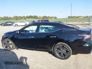 2019 Nissan Maxima Platinum z VIN 1N4AA6AV3KC378092, wystawiony jako IAAI lot #40527428 z przebiegiem 108 643 mil mil oraz . Historia ofert i sprzedaży dostępna na DreamBid. Obrazek 15.