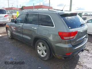 2011 Jeep Grand Cherokee Overland Summit with VIN 1J4RR6GT3BC713812, listed as a IAAI auction lot 42398585 with 208,476 mi miles and . Bid and sale history available at DreamBid. Image 3.