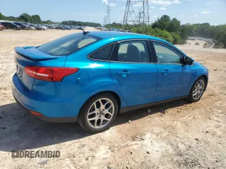 2015 Ford Focus SE with VIN 1FADP3F24FL200786, listed as a Copart auction lot 62662855 with 90,790 mi miles and Salvage title. Bid and sale history available at DreamBid. Image 3.