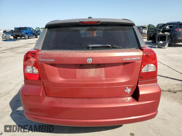 2010 Dodge Caliber Mainstreet z VIN 1B3CB3HA0AD641764, wystawiony jako Copart lot #52440225 z przebiegiem 125 123 mil mil oraz Szkoda całkowita • Salvage title. Historia ofert i sprzedaży dostępna na DreamBid. Obrazek 6.