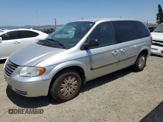 2007 Chrysler Town & Country z VIN 1A4GJ45R27B230335, wystawiony jako Copart lot #60250165 z przebiegiem 149 800 mil mil oraz Szkoda całkowita • Salvage title. Historia ofert i sprzedaży dostępna na DreamBid. Obrazek 1.