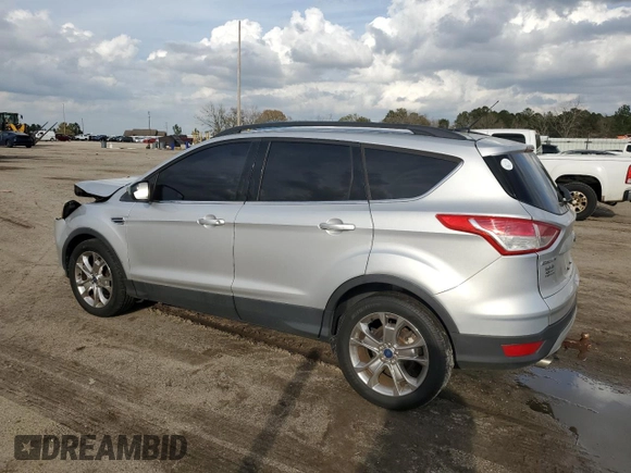 2015 Ford Escape SE with VIN 1FMCU0GX2FUB36390, listed as a Copart auction lot 49014075 with 108,115 mi miles and Salvage Title. Bid and sale history available at DreamBid. Image 2.