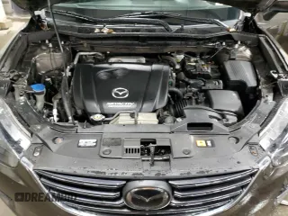2016 Mazda CX-5 Grand Touring with VIN JM3KE4DY4G0600877, listed as a Copart auction lot 85560194 with 82,395 mi miles and Salvage Title. Bid and sale history available at carsss.com. Image 12.