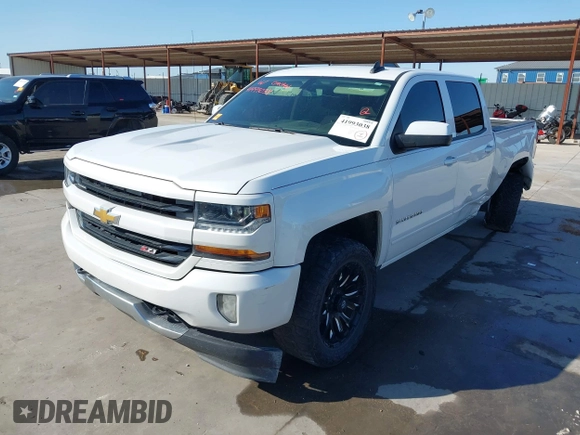 2016 Chevrolet Silverado 1500 LT with VIN 3GCUKREC8GG366278, listed as a IAAI auction lot 41993038 with 176,515 mi miles and . Bid and sale history available at DreamBid. Image 18.