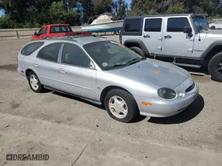 1999 Ford Taurus SE with VIN 1FAFP58S3XG168635, listed as a Copart auction lot 71321624 with 103,308 mi miles and Clean Title. Bid and sale history available at carsss.com. Image 4.