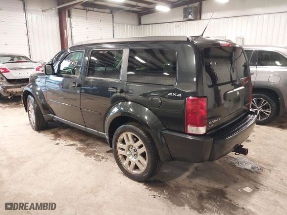 2011 Dodge Nitro Heat with VIN 1D4PU4GX0BW517654, listed as a IAAI auction lot 41715627 with 107,954 mi miles. Bid and sale history available at carsss.com. Image 3.