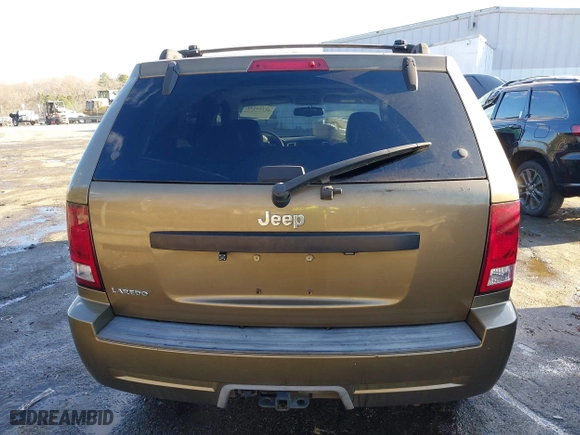 2009 Jeep Grand Cherokee Laredo with VIN 1J8GS48K79C516320, listed as a IAAI auction lot 41353131 with 166,739 mi miles. Bid and sale history available at carsss.com. Image 16.