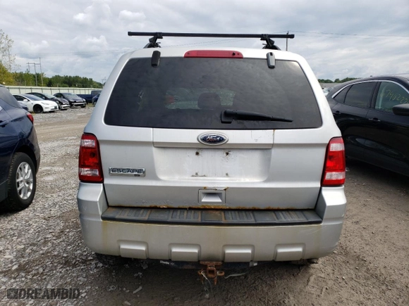 2010 Ford Escape XLT with VIN 1FMCU0D74AKA29043, listed as a Copart auction lot 67198014 with 0 mi miles and Salvage Title. Bid and sale history available at carsss.com. Image 6.