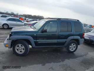 2005 Jeep Liberty Sport with VIN 1J4GL48K15W631101, listed as a IAAI auction lot 41217588 with 168,378 mi miles. Bid and sale history available at carsss.com. Image 14.