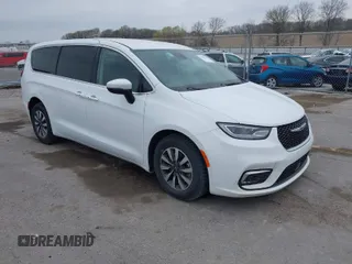 2023 Chrysler Pacifica Hybrid Touring L with VIN 2C4RC1L74PR540870, listed as a IAAI auction lot 42056528 with 46,940 mi miles and . Bid and sale history available at DreamBid. Image 1.