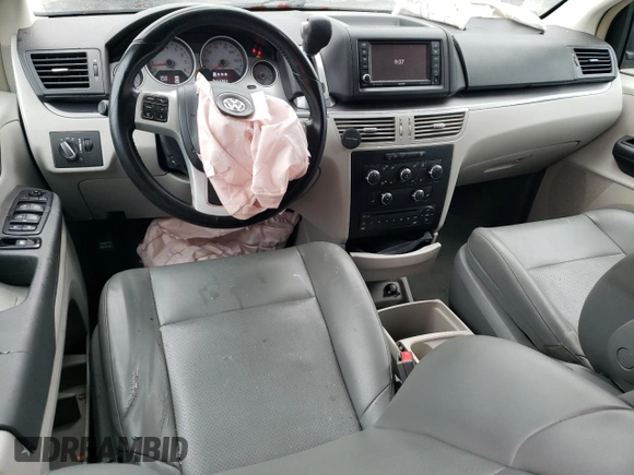 2014 Volkswagen Routan SE z VIN 2C4RVABG1ER134621, wystawiony jako Copart lot #61339414 z przebiegiem 153 364 mil mil oraz Szkoda całkowita • Salvage title. Historia ofert i sprzedaży dostępna na DreamBid. Obrazek 8.