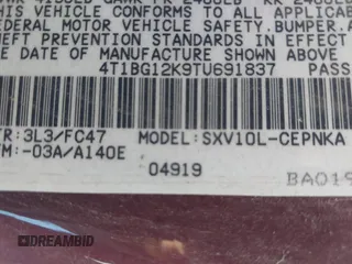 1996 Toyota Camry DX with VIN 4T1BG12K9TU691837, listed as a IAAI auction lot 40267369 with 36,383 mi miles. Bid and sale history available at carsss.com. Image 9.