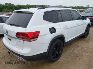 2020 Volkswagen Atlas SE with VIN 1V2WR2CA6LC502996, listed as a IAAI auction lot 42345898 with 94,627 mi miles and . Bid and sale history available at DreamBid. Image 4.