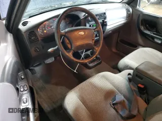 2001 Ford Ranger XLT Appearance with VIN 1FTYR14E31PA31773, listed as a Copart auction lot 50047775 with 260,802 mi miles and Salvage Title. Bid and sale history available at DreamBid. Image 8.
