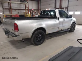 2005 Ford F-150 XL with VIN 1FTRF12W15NA18935, listed as a IAAI auction lot 41942570 with 152,708 mi miles. Bid and sale history available at carsss.com. Image 4.