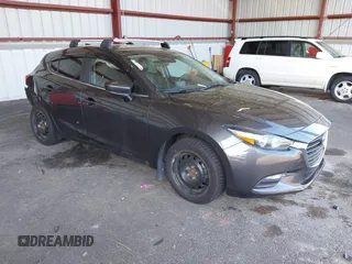 2018 Mazda 3 Touring with VIN 3MZBN1L35JM229453, listed as a IAAI auction lot 42123176 with 113,051 mi miles and . Bid and sale history available at DreamBid. Image 1.