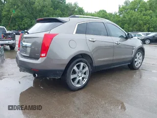 2012 Cadillac SRX Premium Collection z VIN 3GYFNCE3XCS620507, wystawiony jako IAAI lot #42348835 z przebiegiem 184 737 mil mil oraz . Historia ofert i sprzedaży dostępna na DreamBid. Obrazek 4.