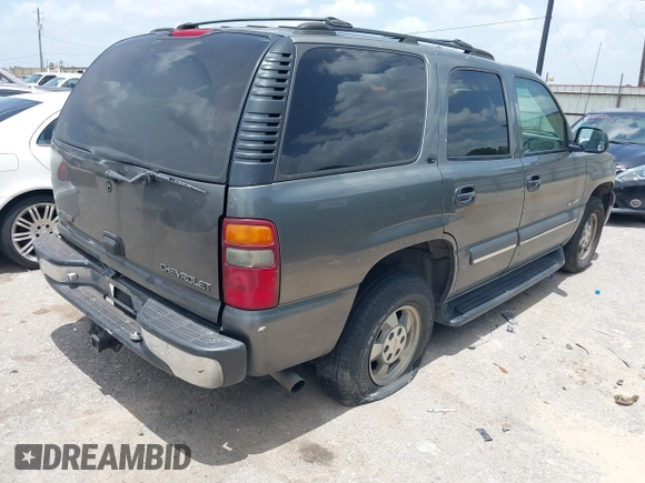 2002 Chevrolet Tahoe LS z VIN 1GNEC13ZX2R135330, wystawiony jako IAAI lot #42526127 z przebiegiem 277 208 mil mil oraz . Historia ofert i sprzedaży dostępna na DreamBid. Obrazek 4.