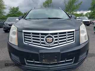 2015 Cadillac SRX Luxury Collection z VIN 3GYFNEE34FS510360, wystawiony jako IAAI lot #42343737 z przebiegiem 149 046 mil mil oraz . Historia ofert i sprzedaży dostępna na DreamBid. Obrazek 6.