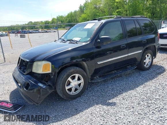 2007 GMC Envoy SLE with VIN 1GKDT13S372103718, listed as a IAAI auction lot 41886111 with 238,423 mi miles. Bid and sale history available at carsss.com. Image 2.